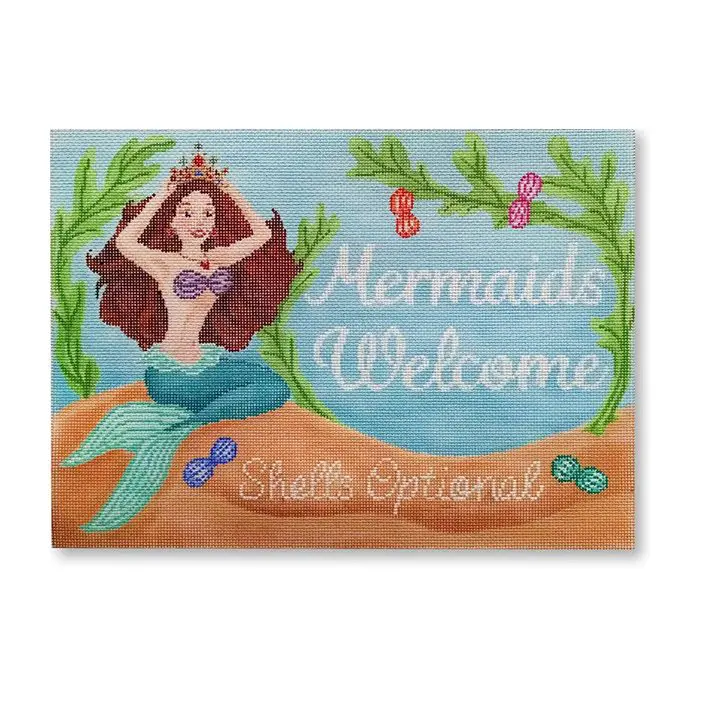 Cecilia Ohm Eriksen's mermaid welcome sign featuring a mermaid in the sand.