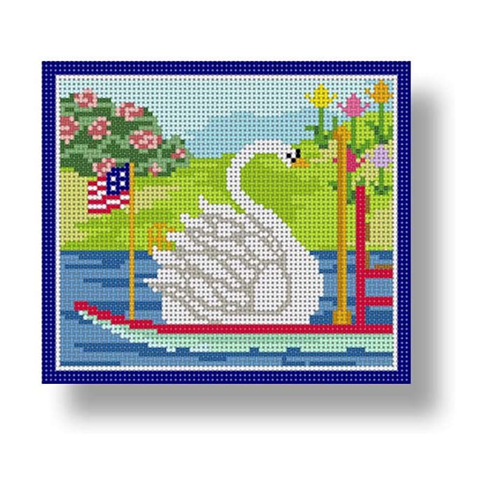 A cross stitch picture of a swan on a boat by Cecilia Ohm Eriksen.