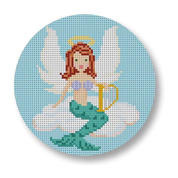 A cross stitch pattern by Cecilia Ohm Eriksen featuring a mermaid on a cloud.