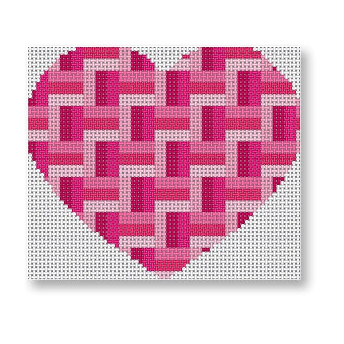A cross stitch pattern of a pink heart on a white background designed by Cecilia Ohm.
