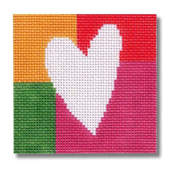 A cross stitch pattern of a heart on a colorful background by Cecilia Ohm Eriksen.