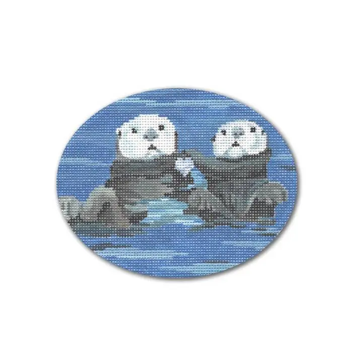 A cross stitch picture of two otters in the water by Cecilia Ohm Eriksen.