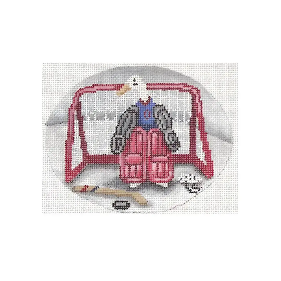 Cecilia Ohm Eriksen creates a breathtaking cross stitch picture of a hockey goalie.