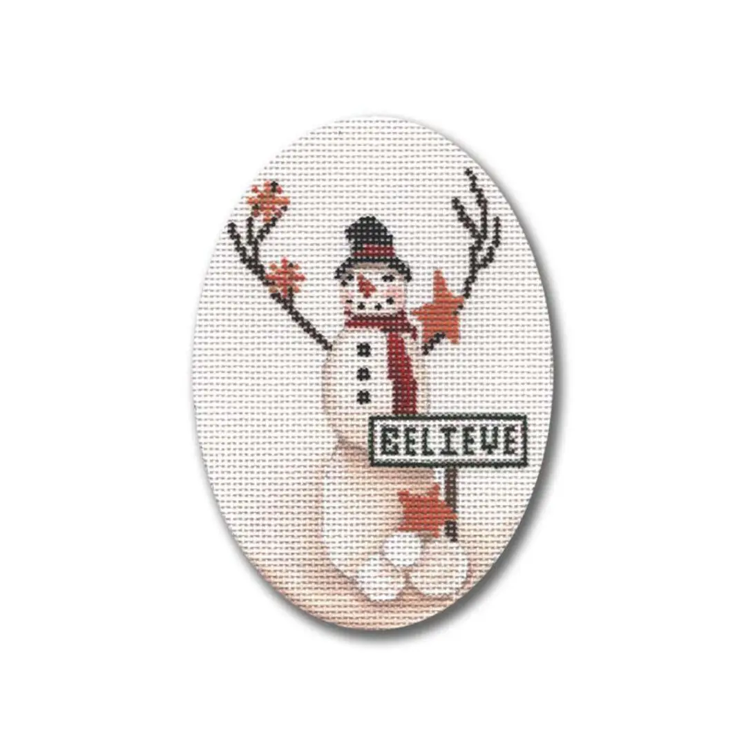 A cross stitch pattern from the Ciao Bella Collection featuring a snowman with the words believe.