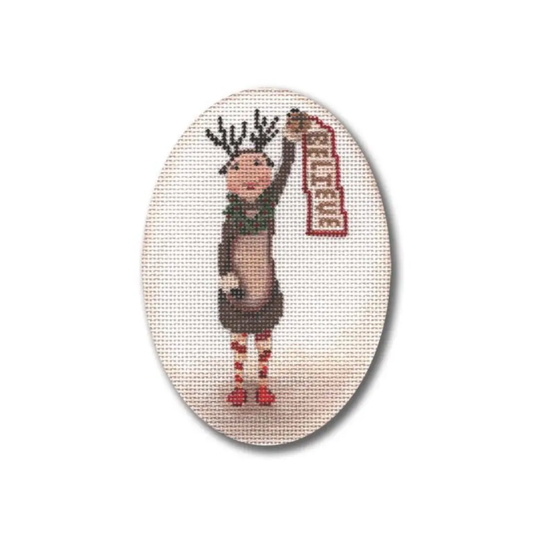 A Ciao Bella Collection cross stitch pattern of a reindeer holding a sign.