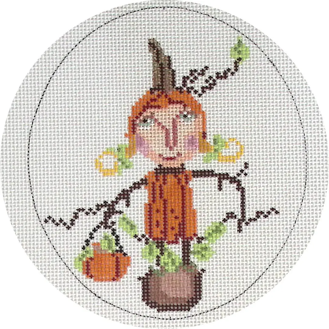 A cross stitch picture of a pumpkin in a basket from the Ciao Bella Collection.