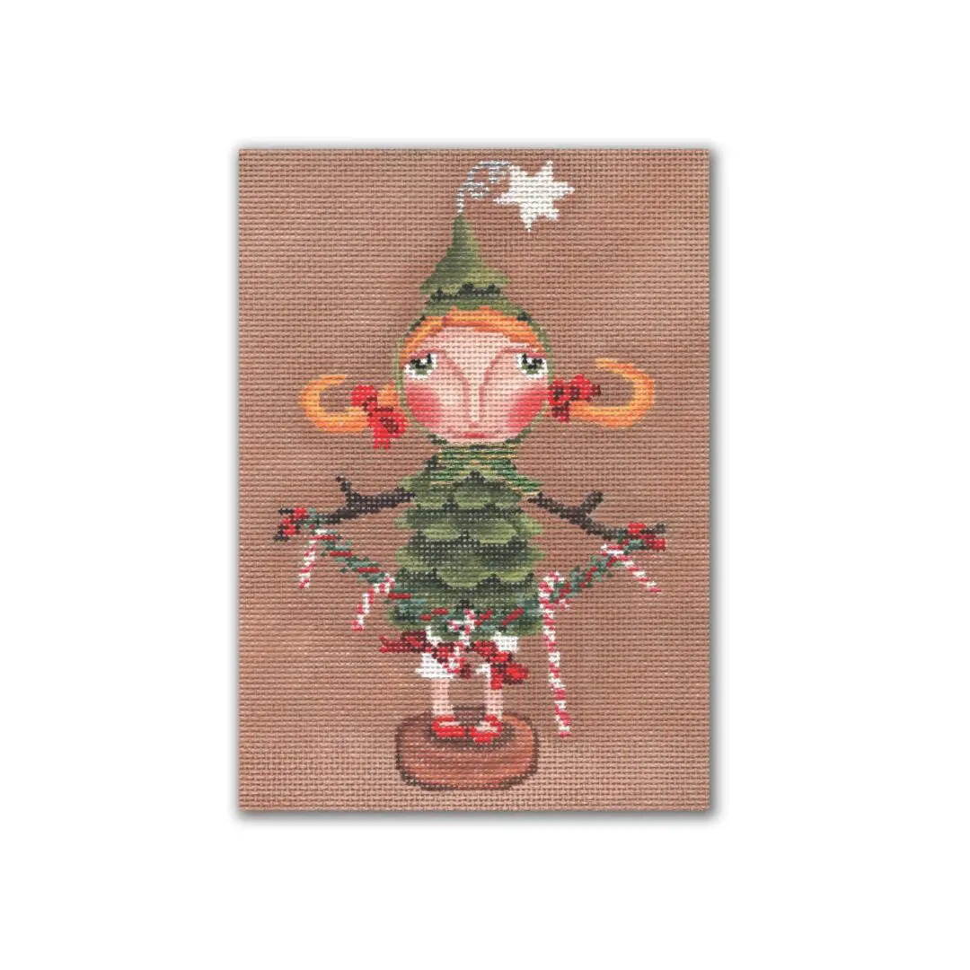 A Ciao Bella Collection christmas tree doll with candy canes on a brown background.