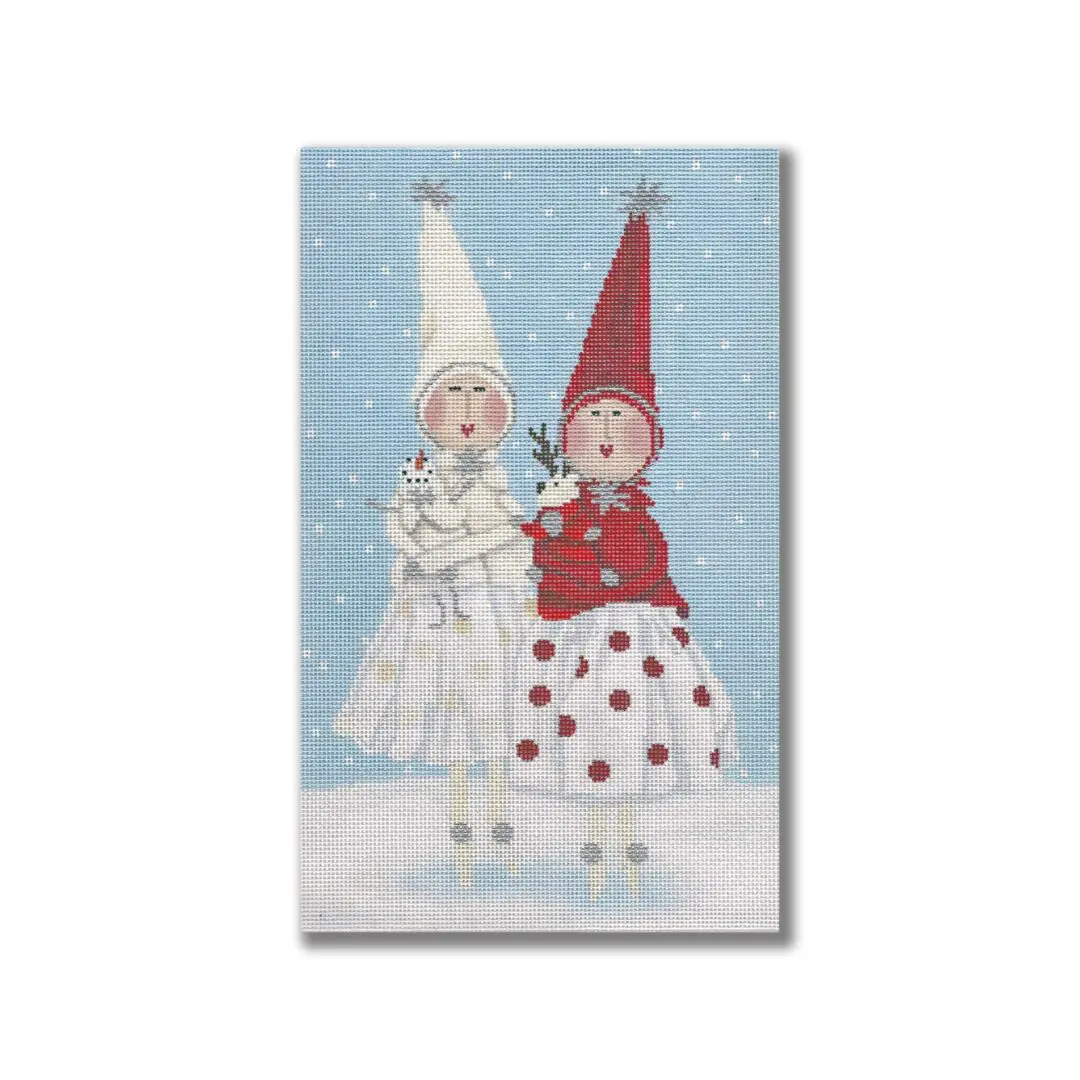 Two girls in red and white polka dot hats from the Ciao Bella Collection on a blue background.