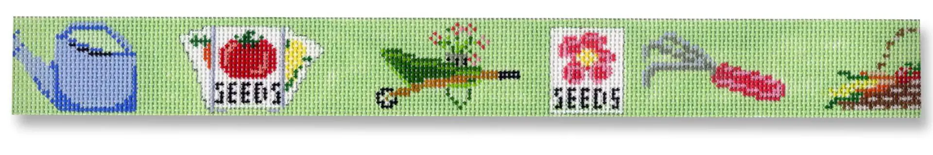 A cross stitch pattern of various items on a green background.