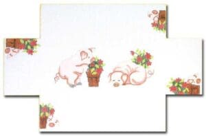 A white tile with two pigs and flowers on it.