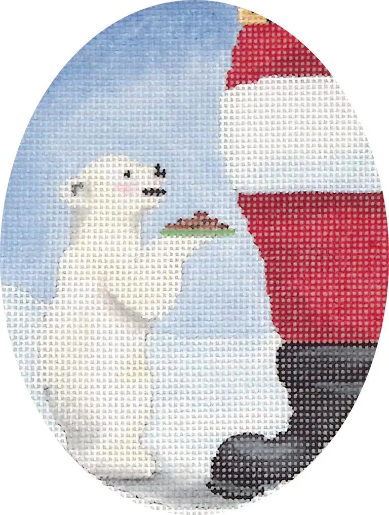 A cross stitch picture of a polar bear and santa claus.