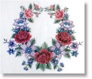 A circular floral wreath design featuring various flowers, including roses, in shades of pink, red, blue, and purple, set against a white background.